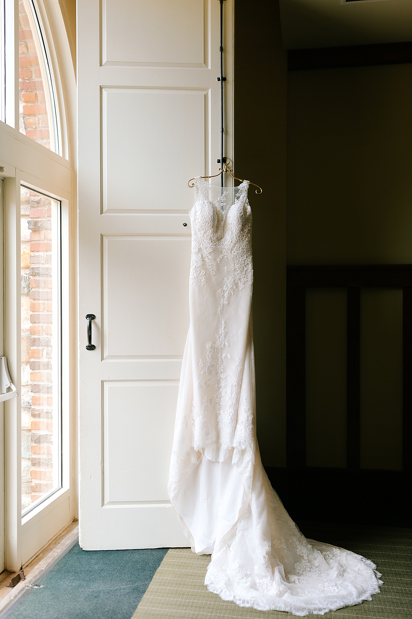 bride's dress hangs at the Graylyn Estate