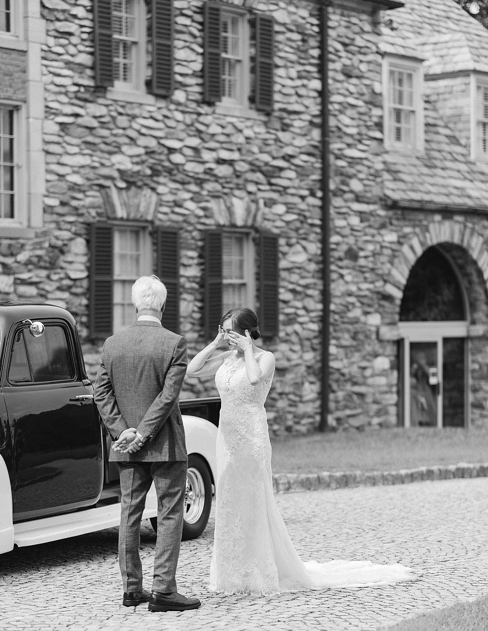 bride cries during first look with her dad