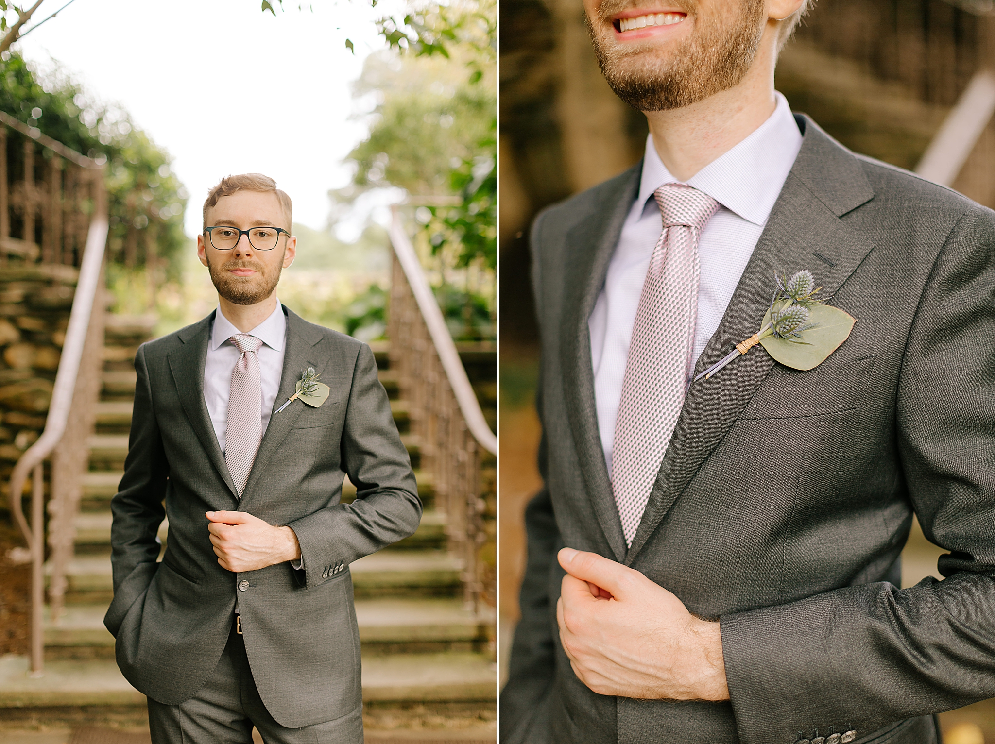 groom poses by staircase with grey suit