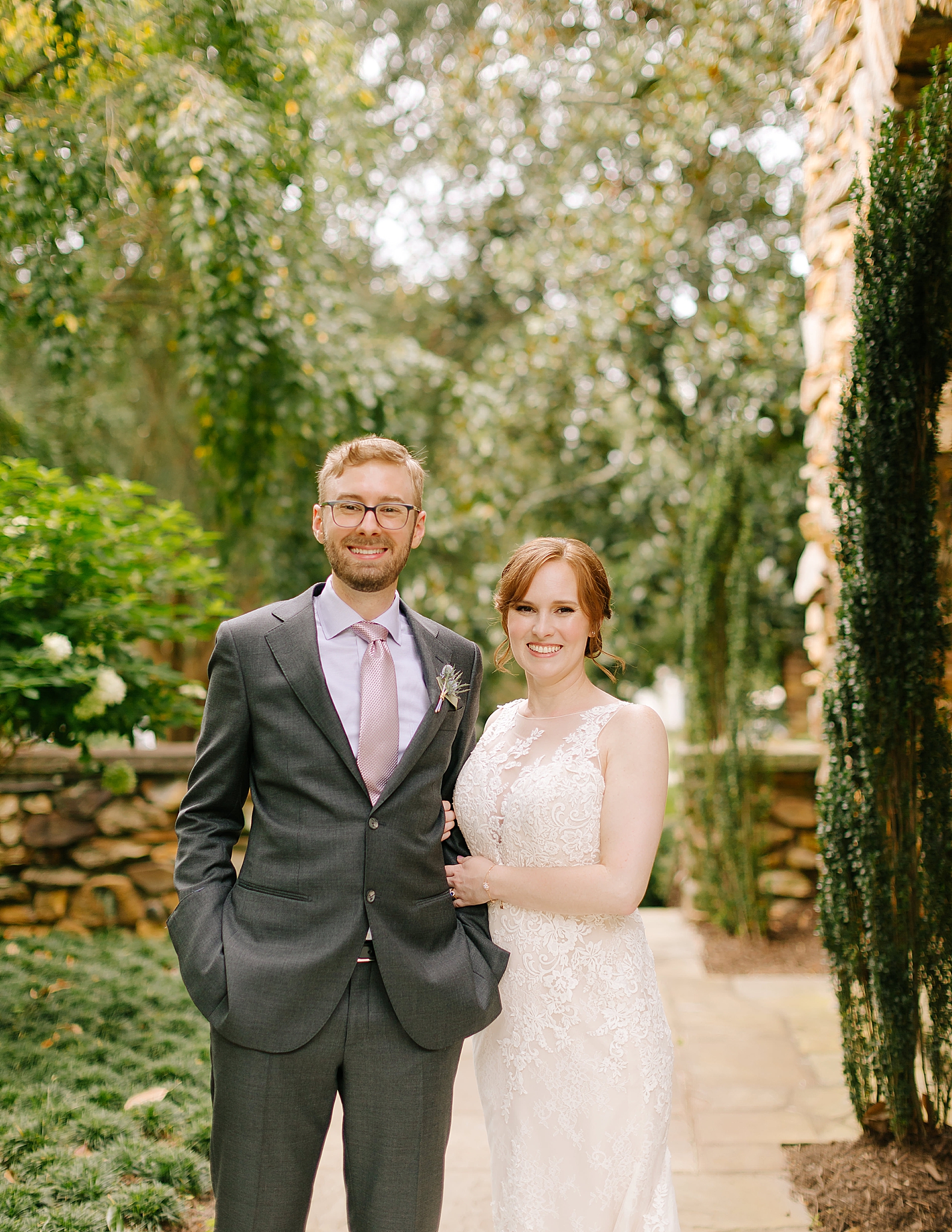 bride and groom pose together before Microwedding at The Graylyn Estate