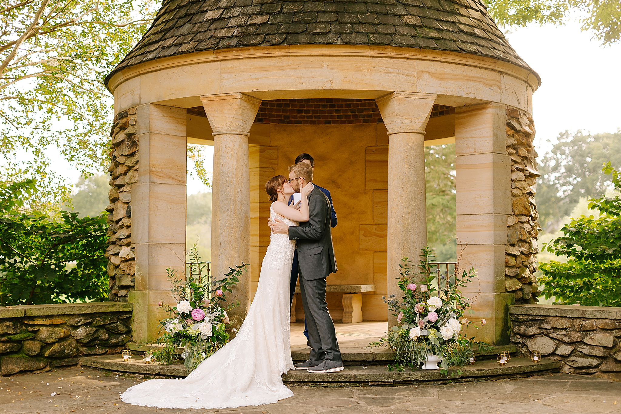 bride and groom kiss after Graylyn Estate wedding ceremony