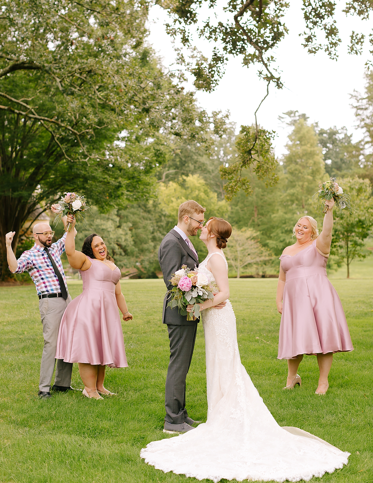 microwedding portraits of bride and groom with wedding party