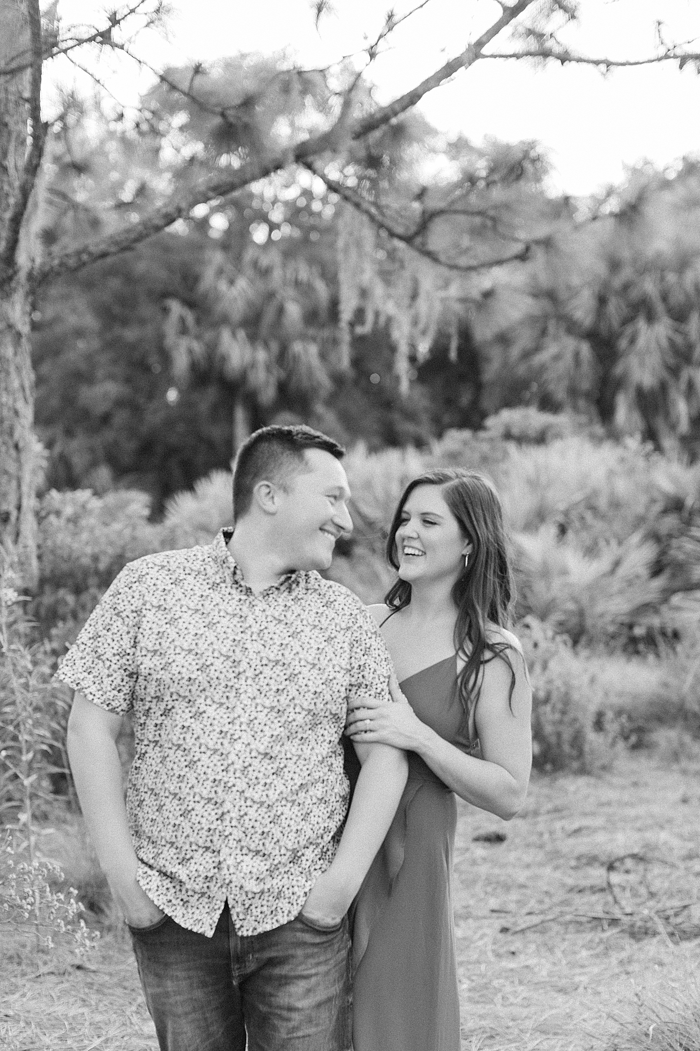 bride and groom look at each other during Bok Tower engagement session