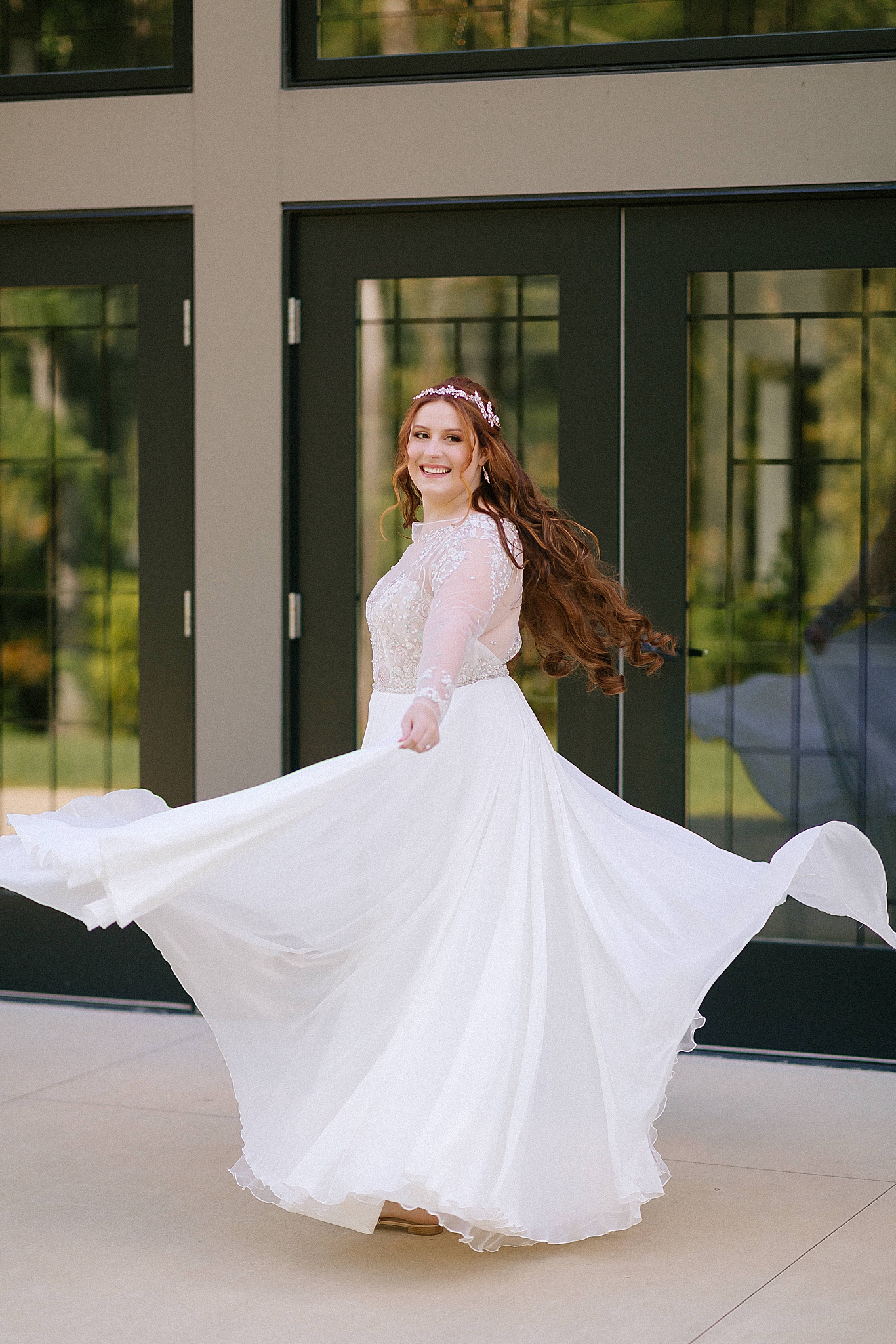 bridal portrait with bride spinning gown