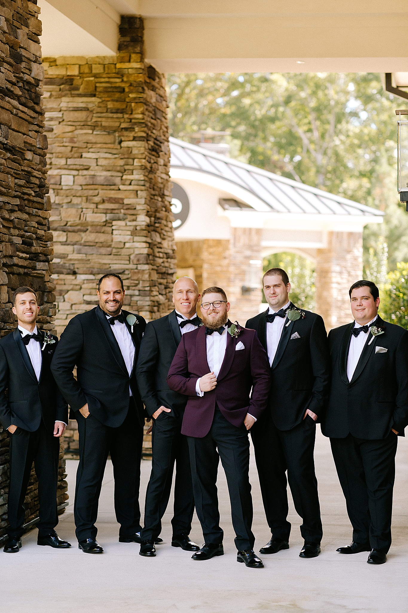 groom poses with groomsmen before Southern Charm Events wedding