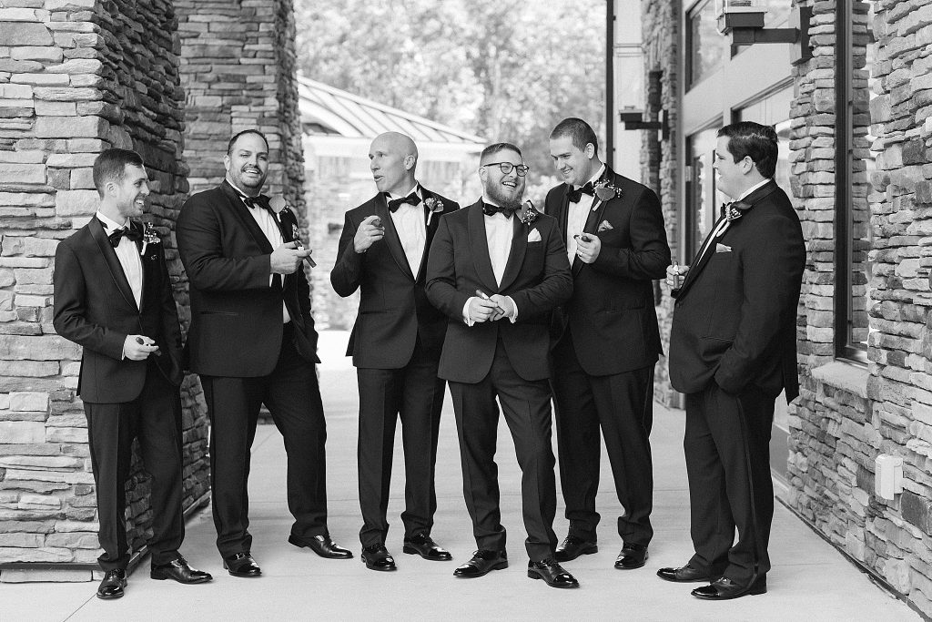 groom talks with groomsmen before Southern Charm Events wedding