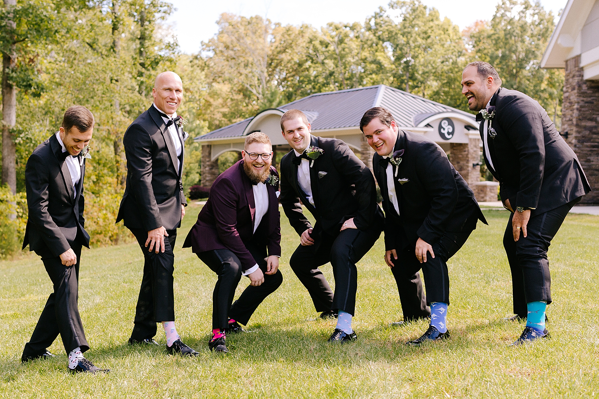groomsmen show off custom socks at Southern Charm Events