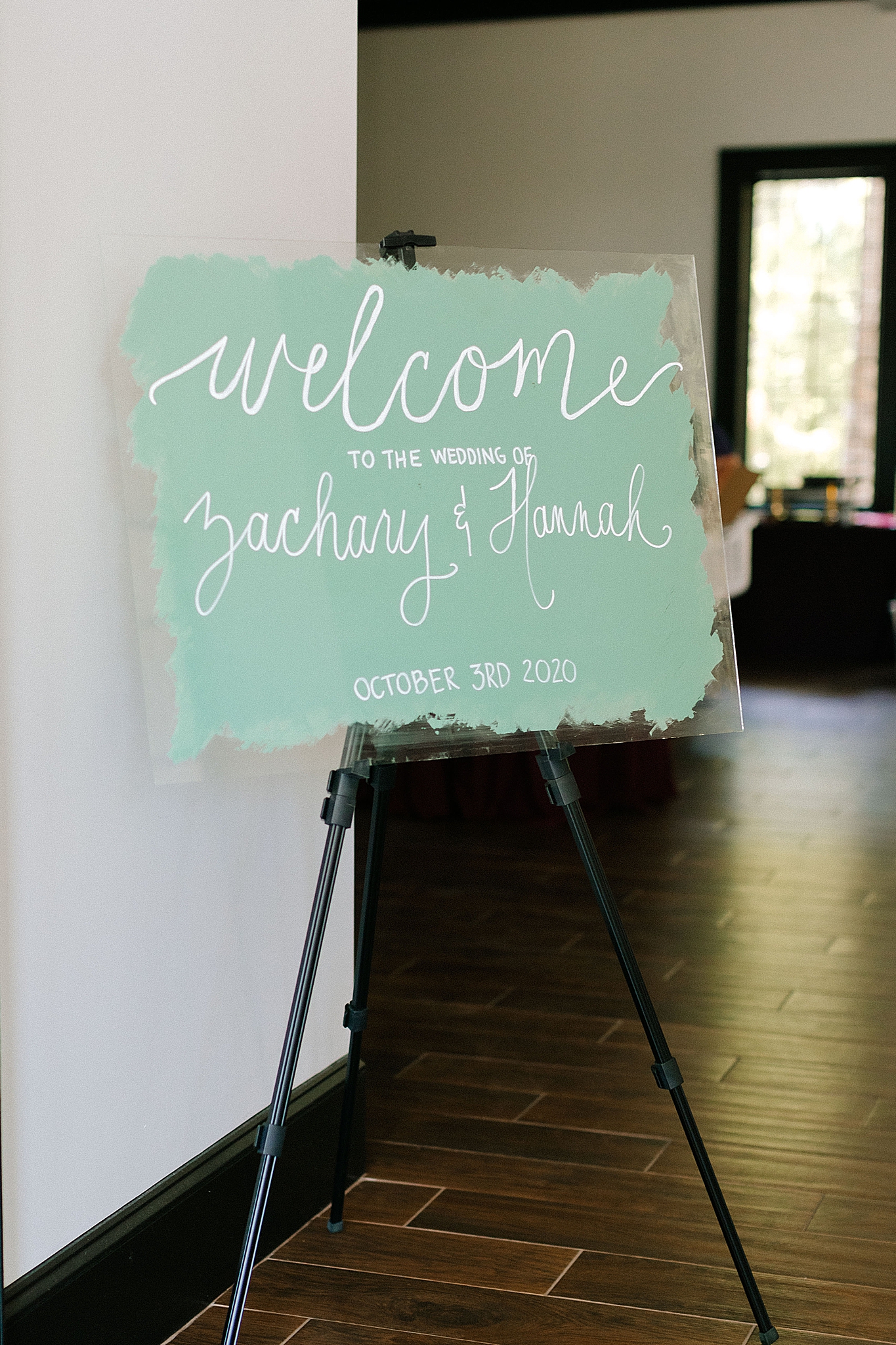 teal acrylic wedding welcome sign at Southern Charm Events wedding reception