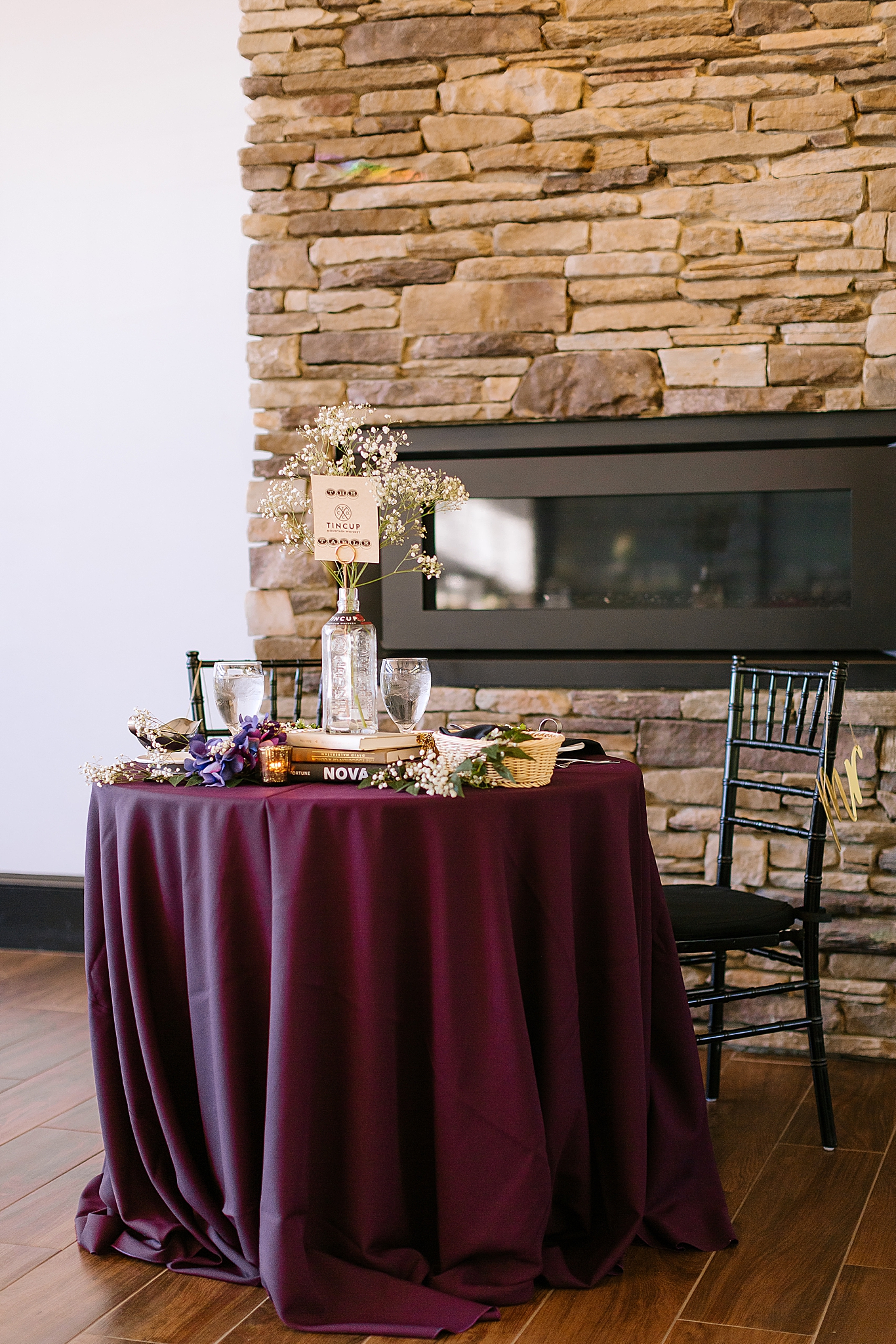 sweetheart table with plum table cloth
