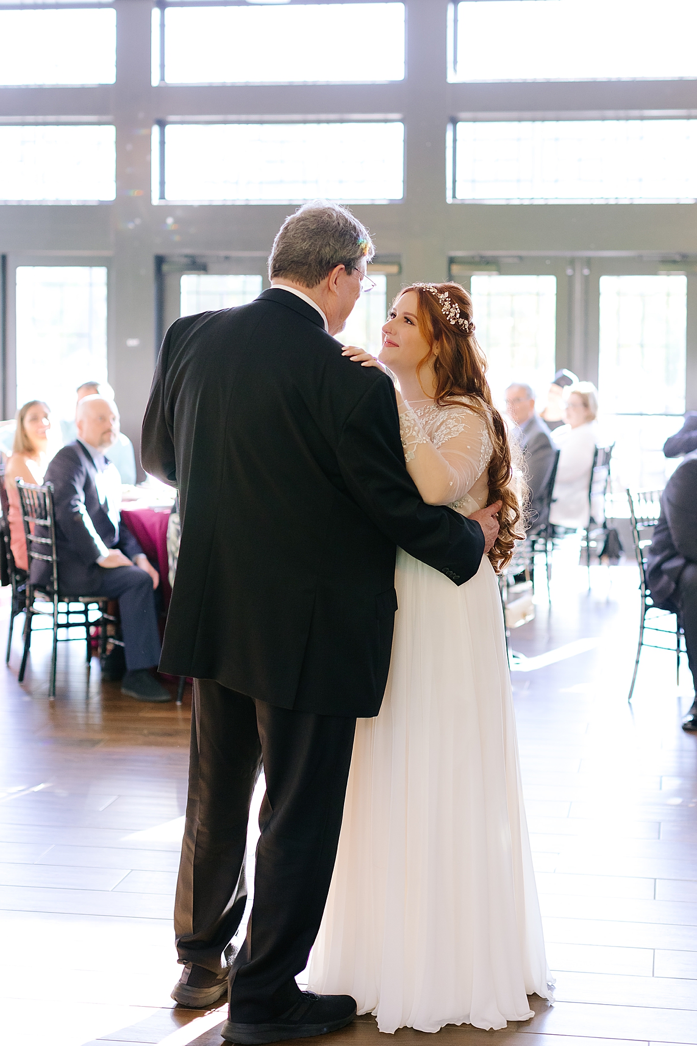 bride dances with dad during wedding reception at Southern Charm Events