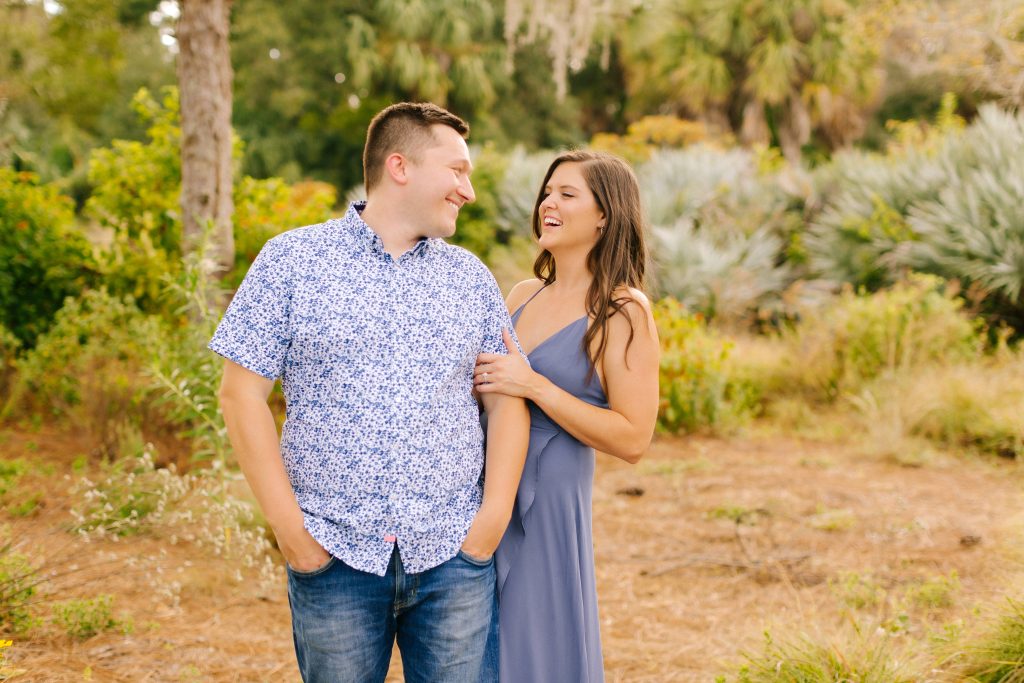 engaged couple laughing during engagement photos at Bok Tower Gardens