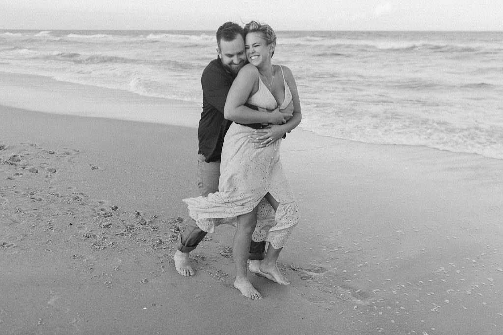 bride and groom laugh during Palm Coast engagement photos