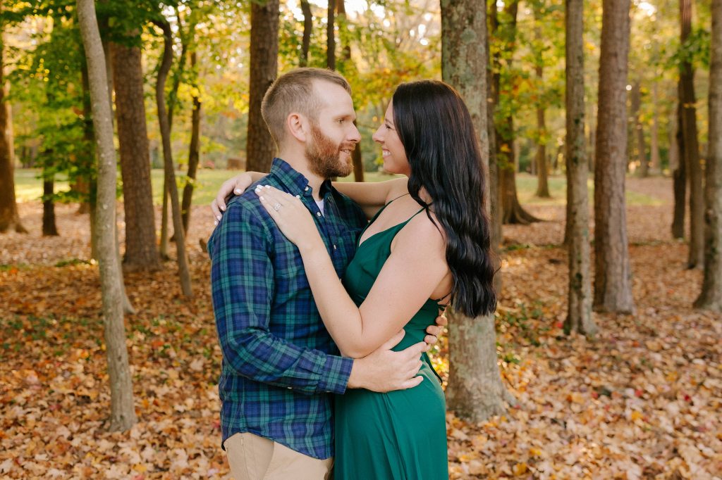 anniversary portraits in green gown at Greensboro Botanical Gardens