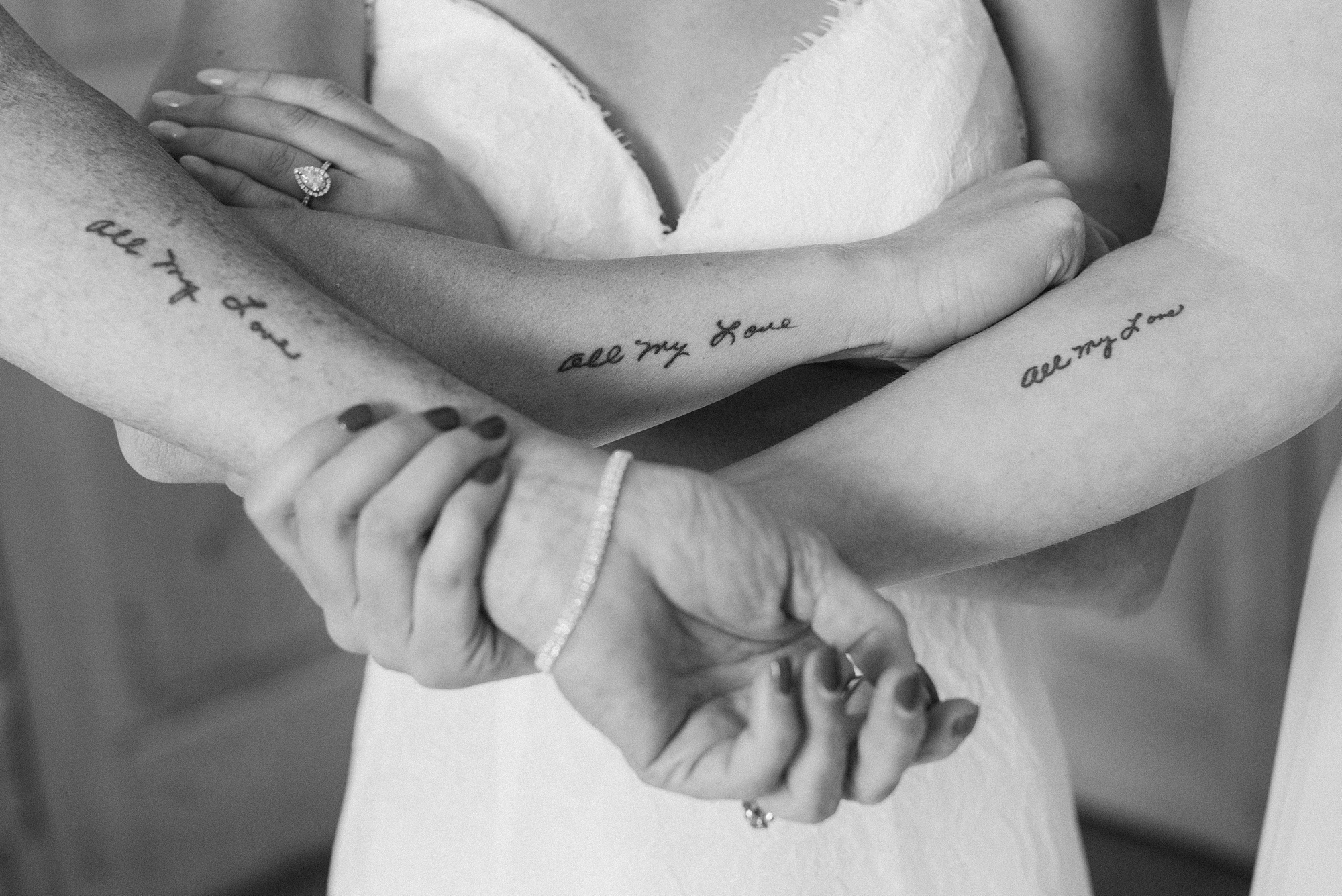 bride and family show off matching tattoos 