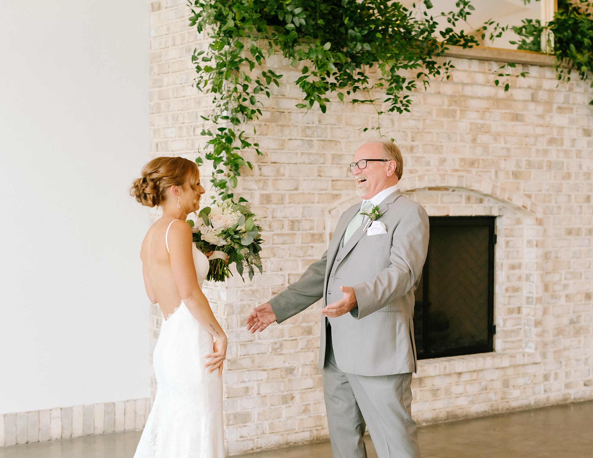 bride and dad have first look in Wrightsville Manor