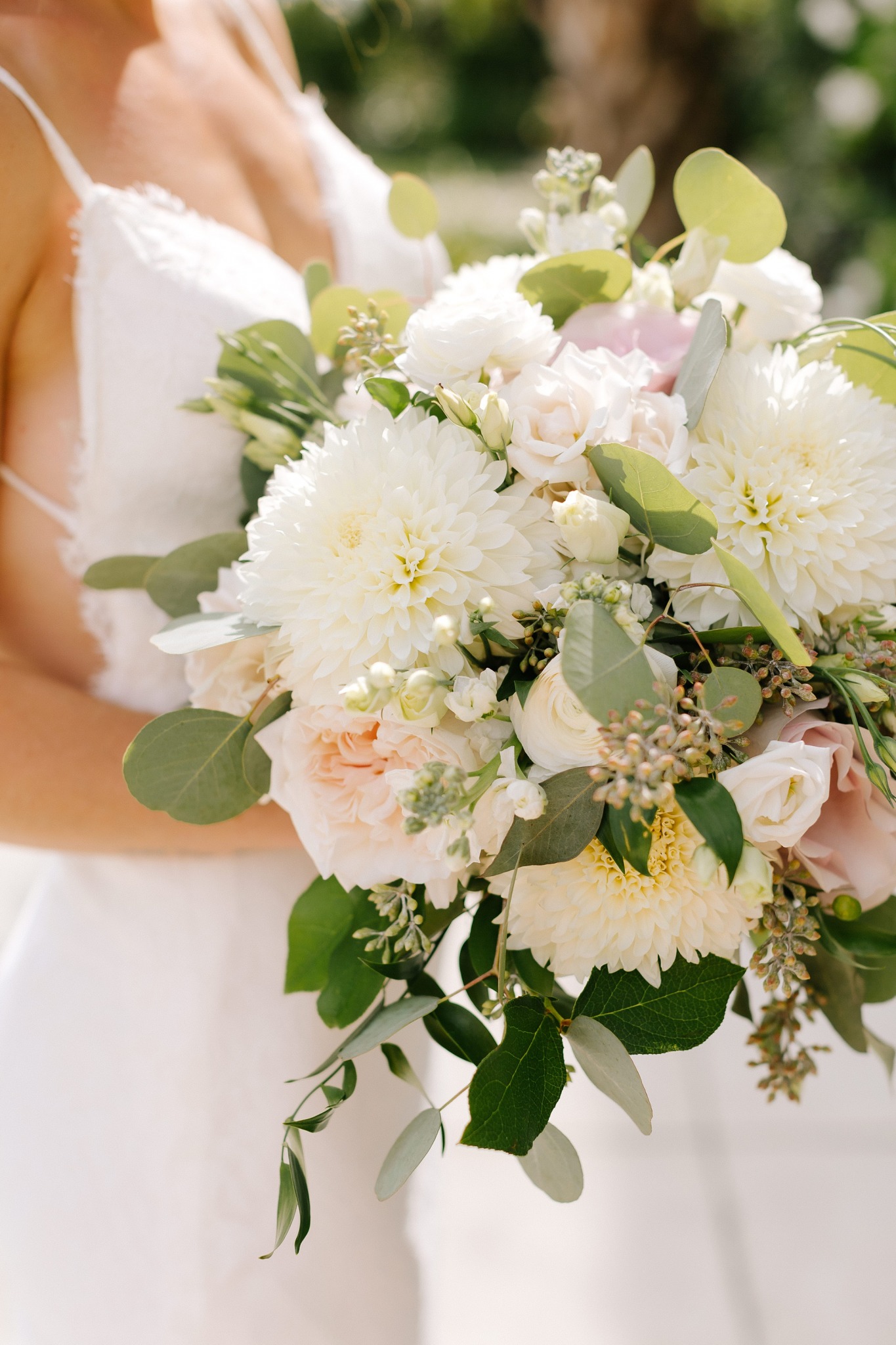 bride's bouquet of white and pale pink flowers