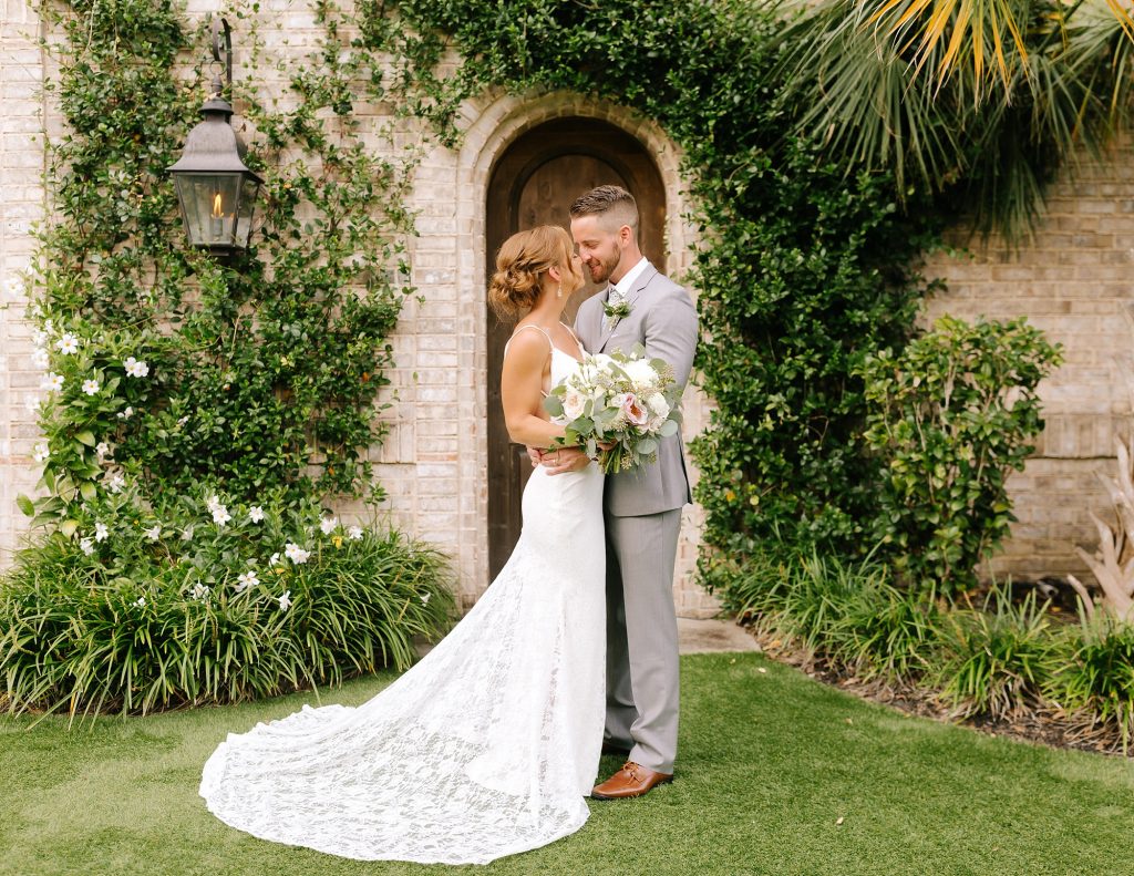 bride and groom kiss in Wilmington NC