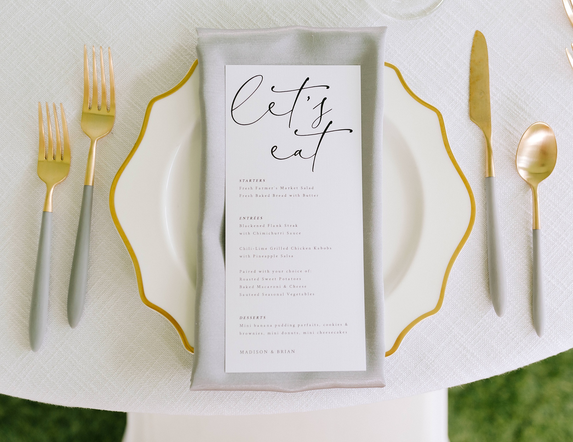 elegant white and gold place settings for Wrightsville Manor reception