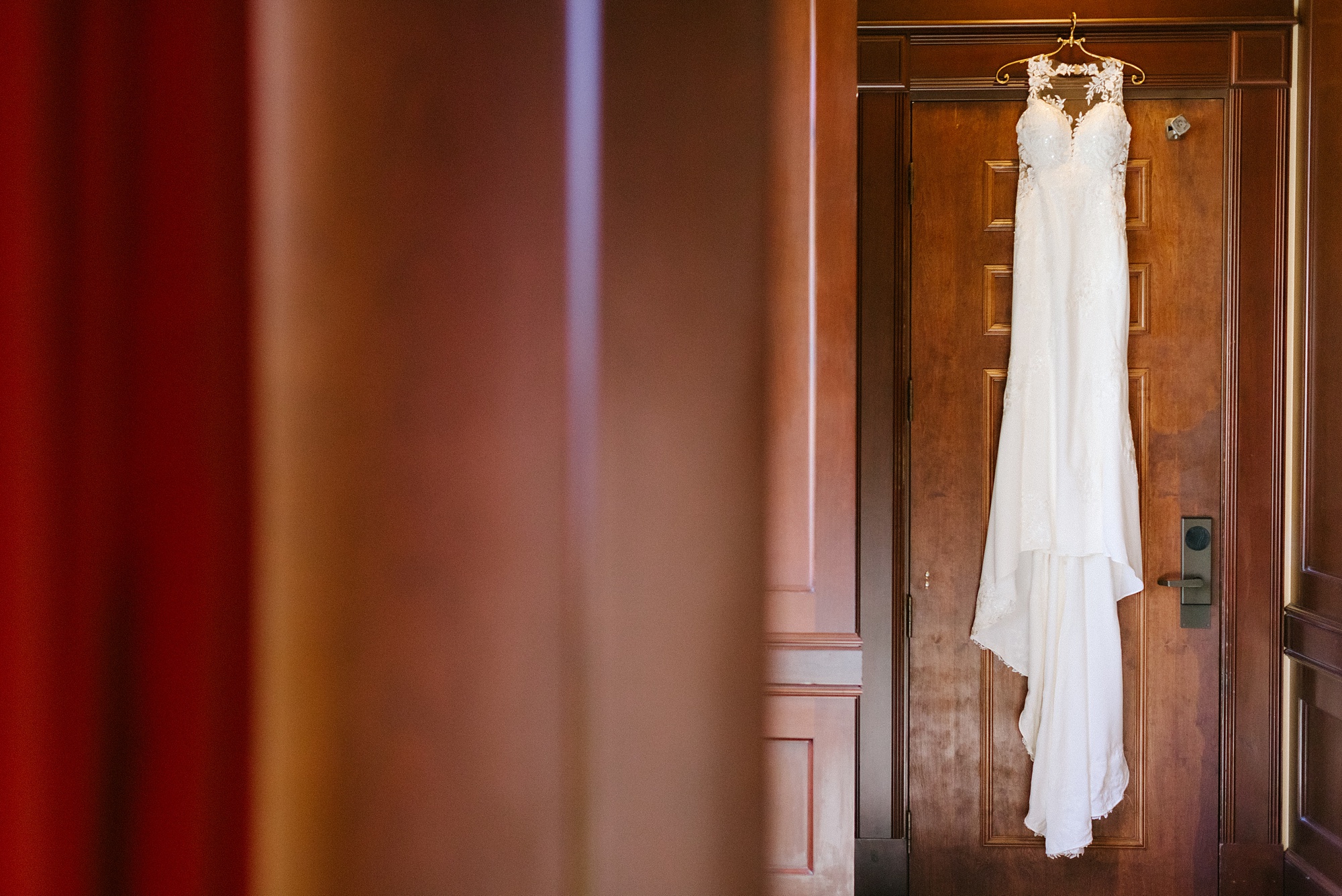 wedding dress hangs before Alabama wedding