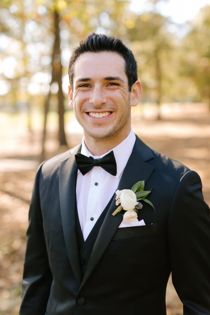 groom wears classic tux for Alabama wedding