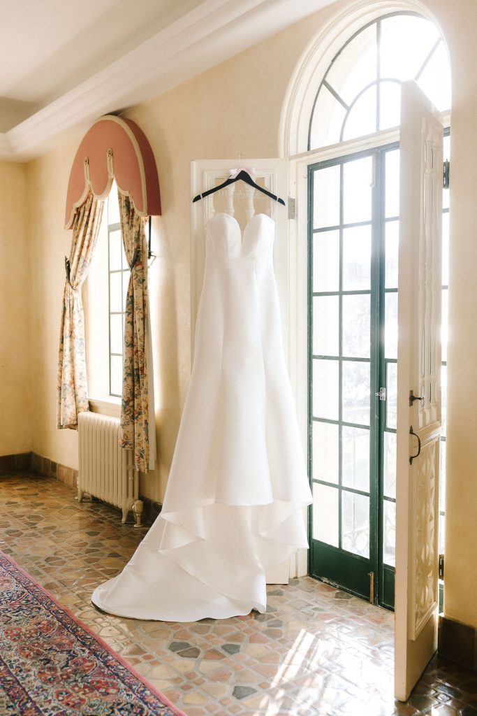 wedding dress hangs in Powel Crosley Estate