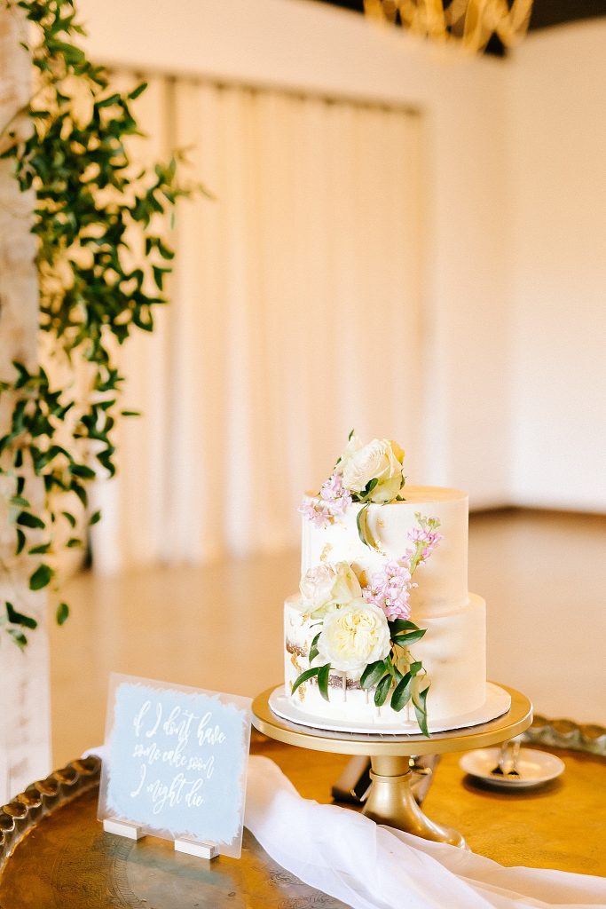 tiered wedding cake with floral details