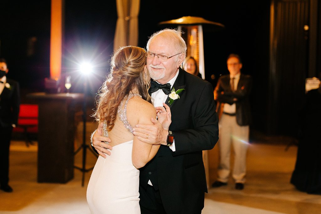 dad and bride dance during reception at The Meadows Raleigh