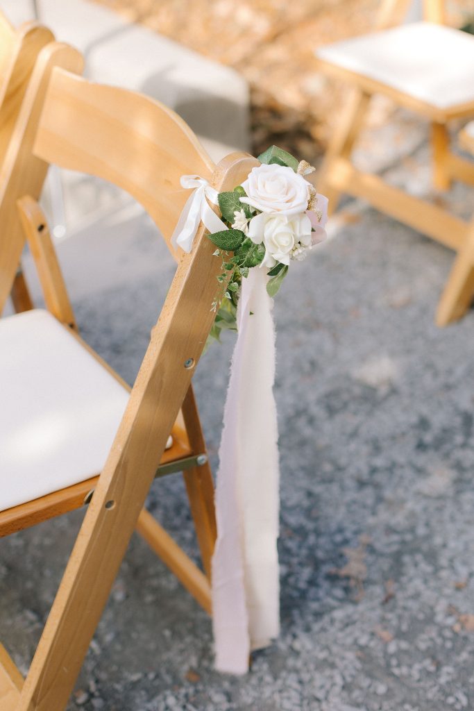 simple floral decor on seats at ceremony in Atlanta