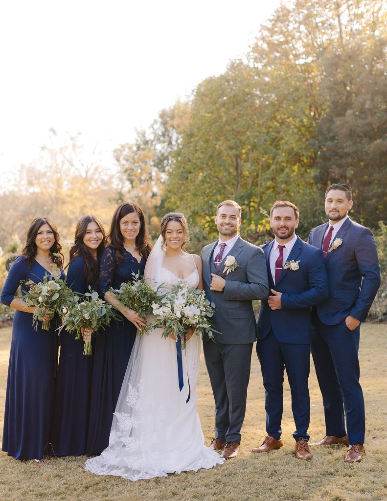 bride and groom pose with bridal party after intimate ceremony in Downtown Atlanta