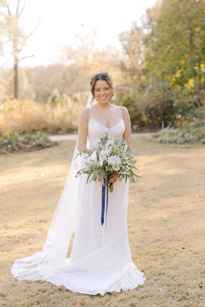 bride holds bouquet during portraits in Atlanta