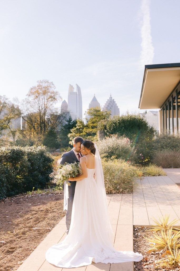 wedding portraits with Downtown Atlanta in backdrop