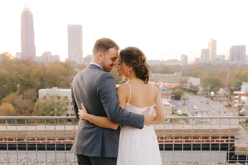 Downtown Atlanta rooftop wedding portraits overlooking city