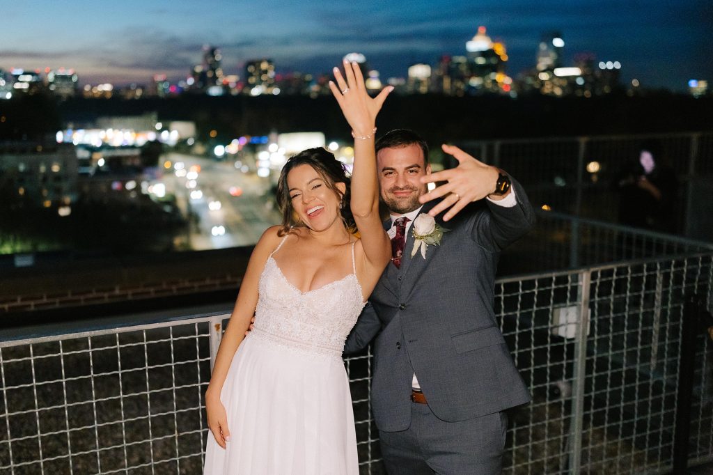 nighttime wedding portraits overlooking Downtown Atlanta at sunset