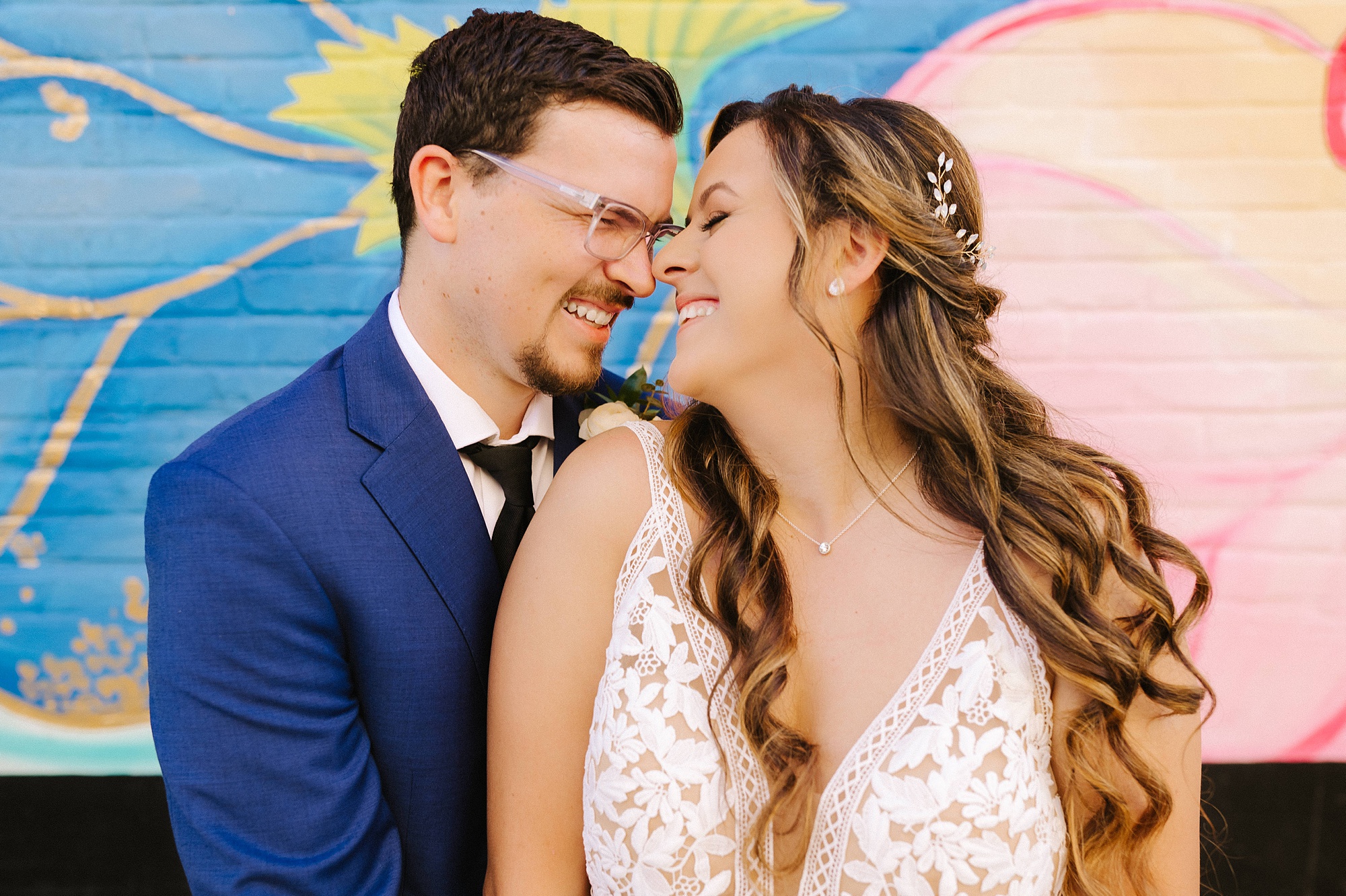 bride and groom laugh together during Florida wedding portraits