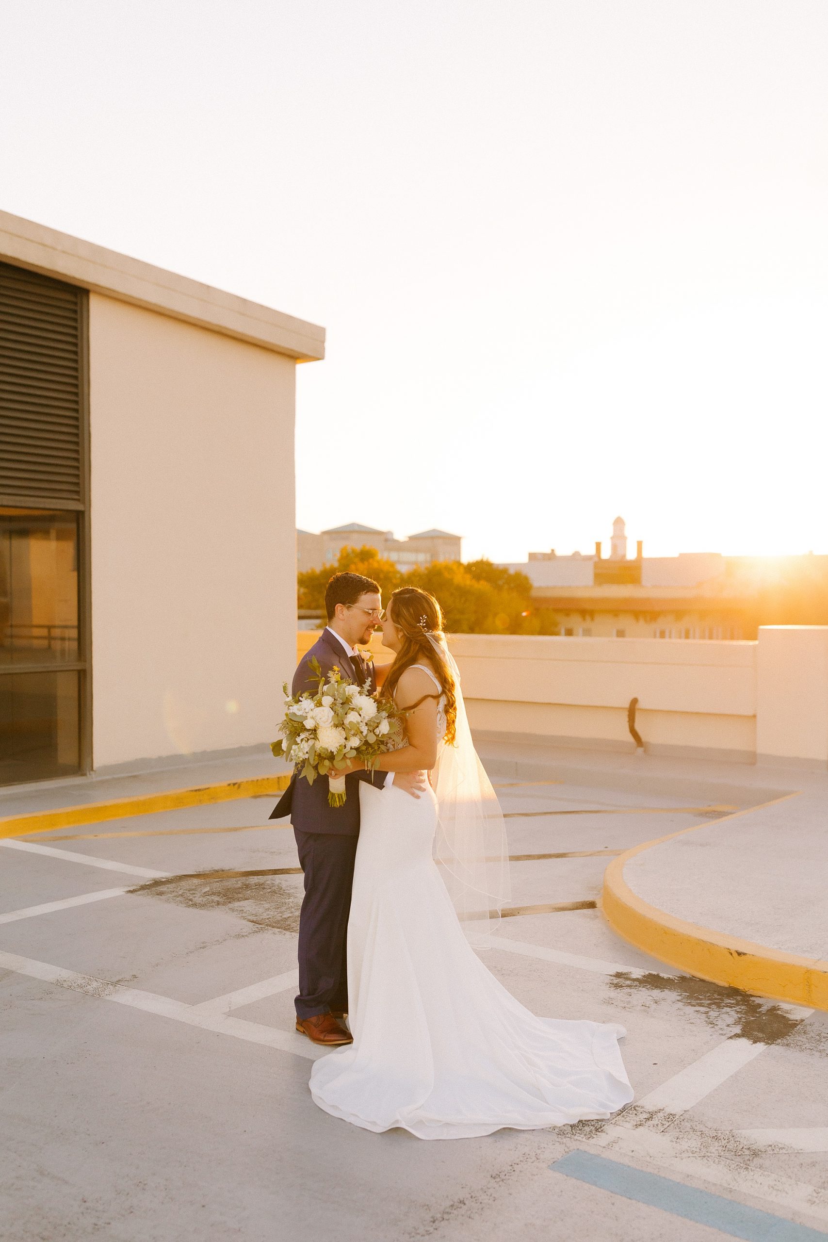 Downtown Lakeland sunset wedding portraits on hotel roof