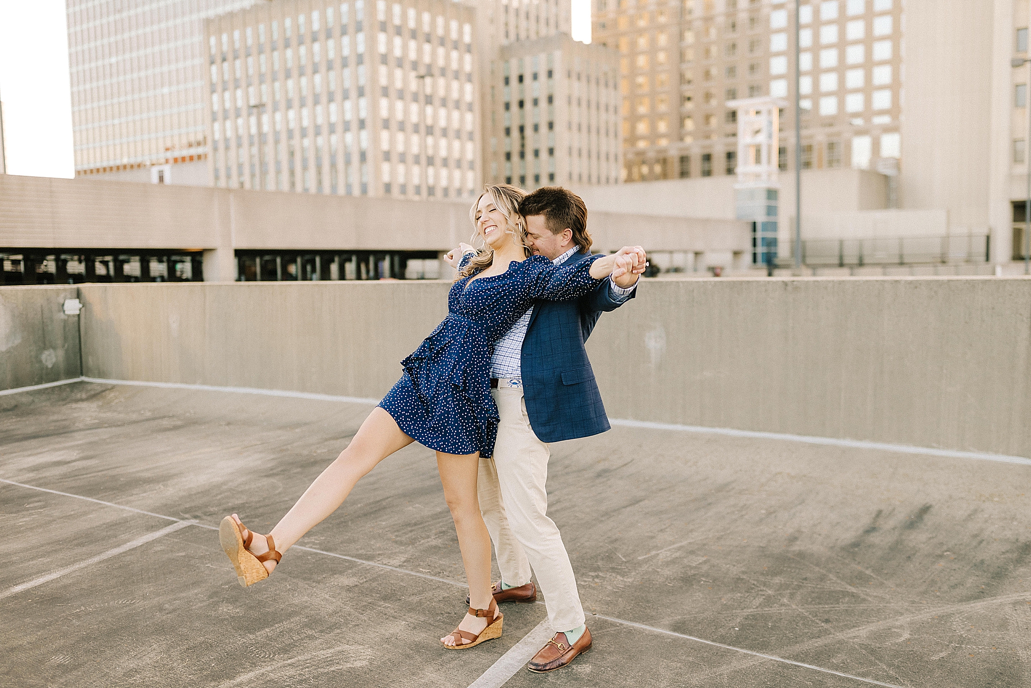 bride leans into groom during NC engagement session