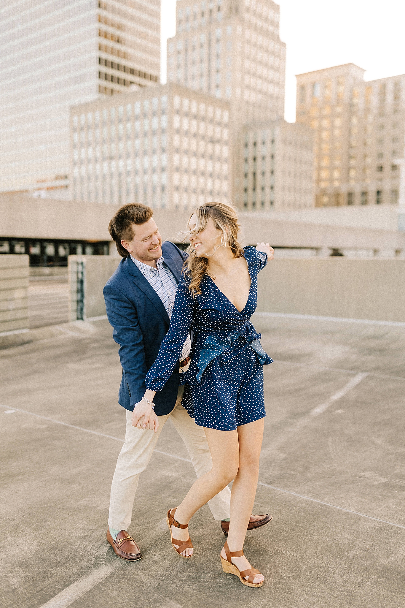 couple dances on Downtown Winston Salem rooftop