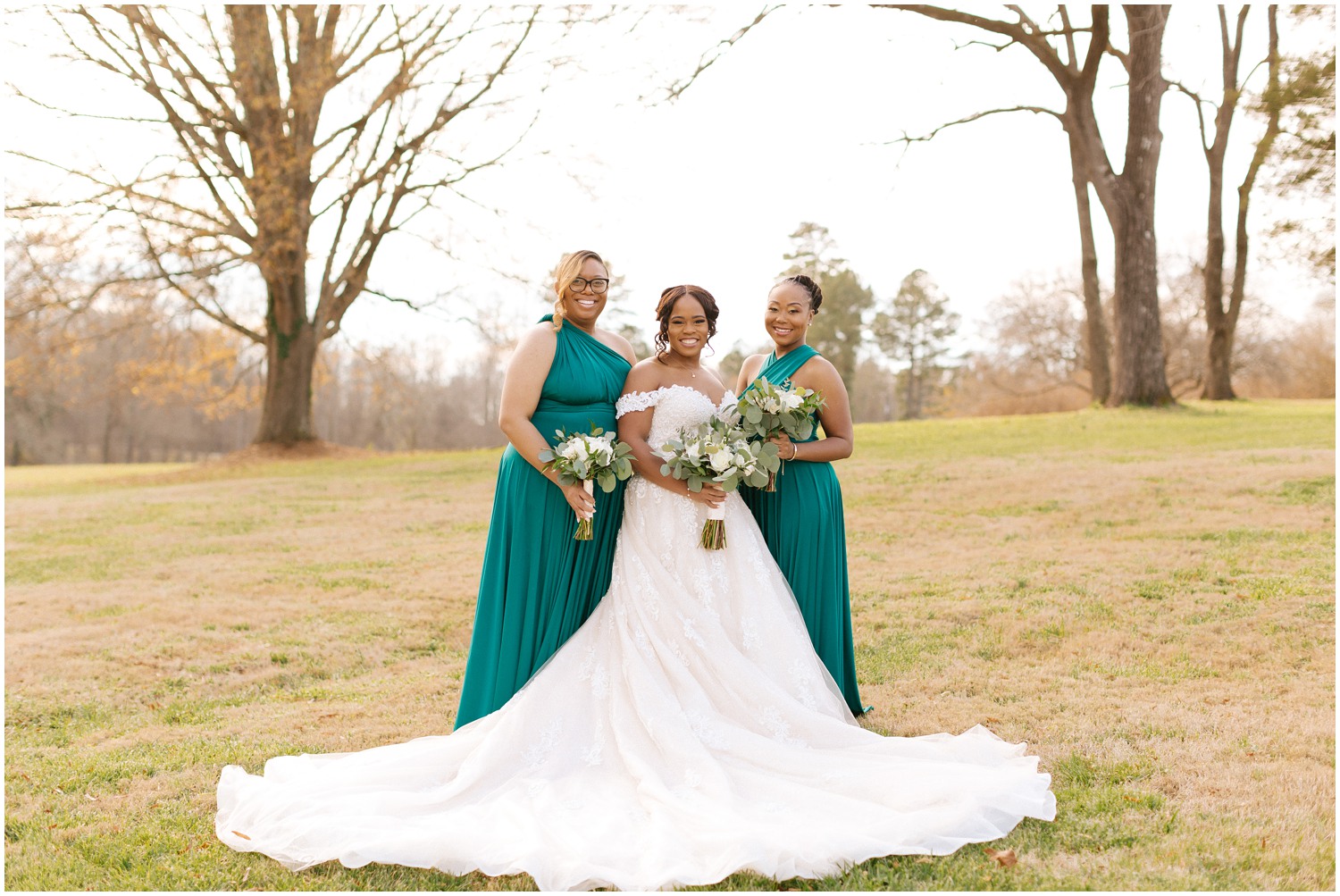 Bridesmaids in colorful gowns at The Barn at Valhalla.
