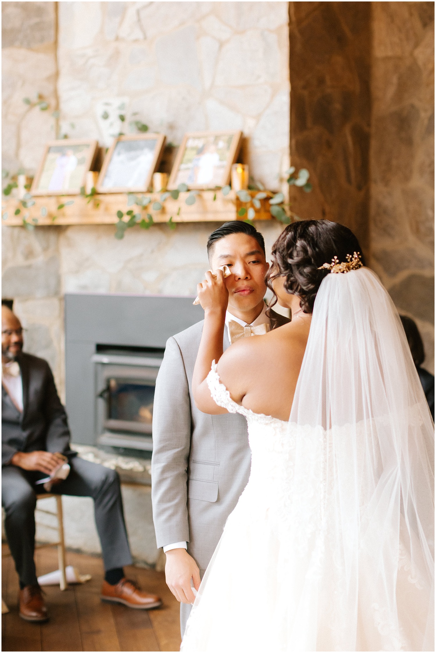 Bride wipes away tear for groom at Raleigh Wedding with NC Wedding Photographer Chelsea Renay