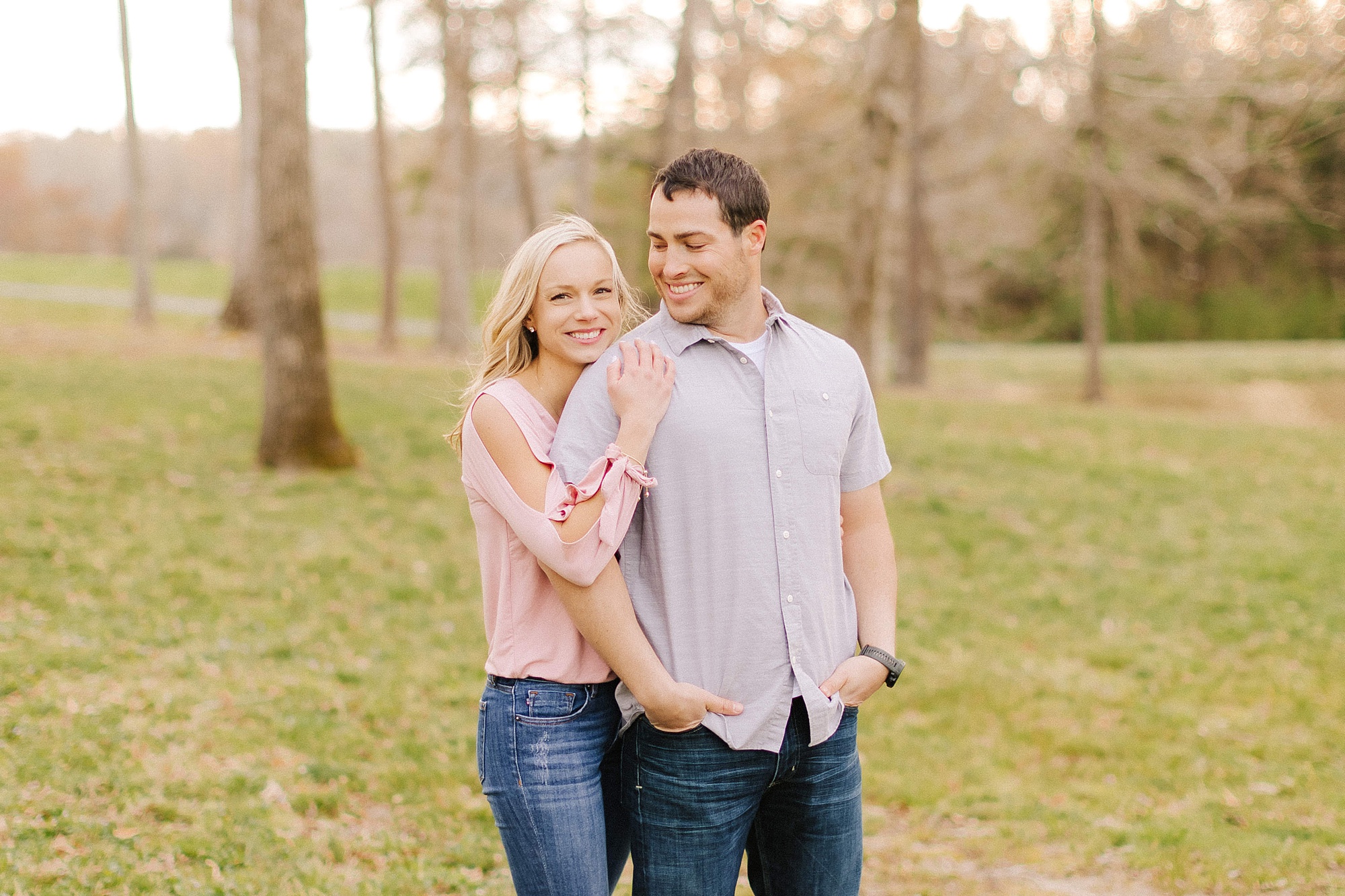 bride and groom pose during Summerfield Farms engagement session