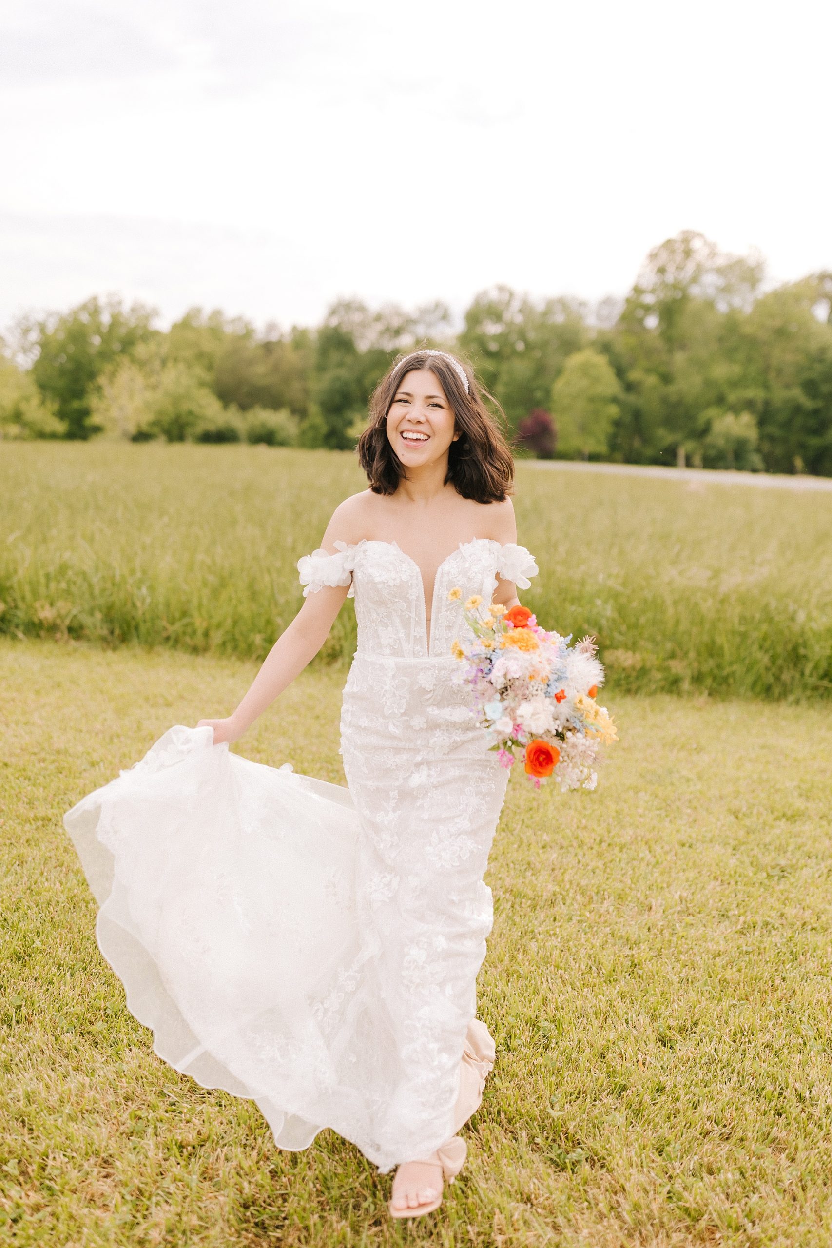 bride twirls wedding gown during elopement photos