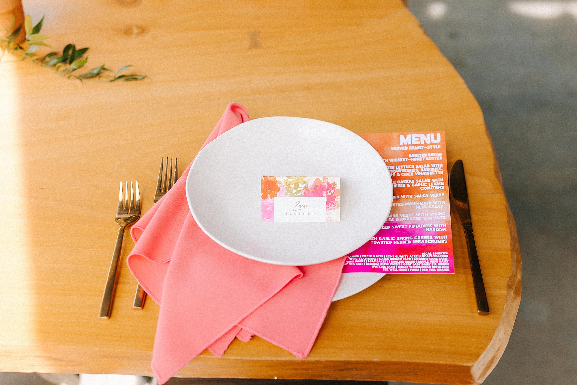 colorful place setting for wedding reception at The Meadows Raleigh