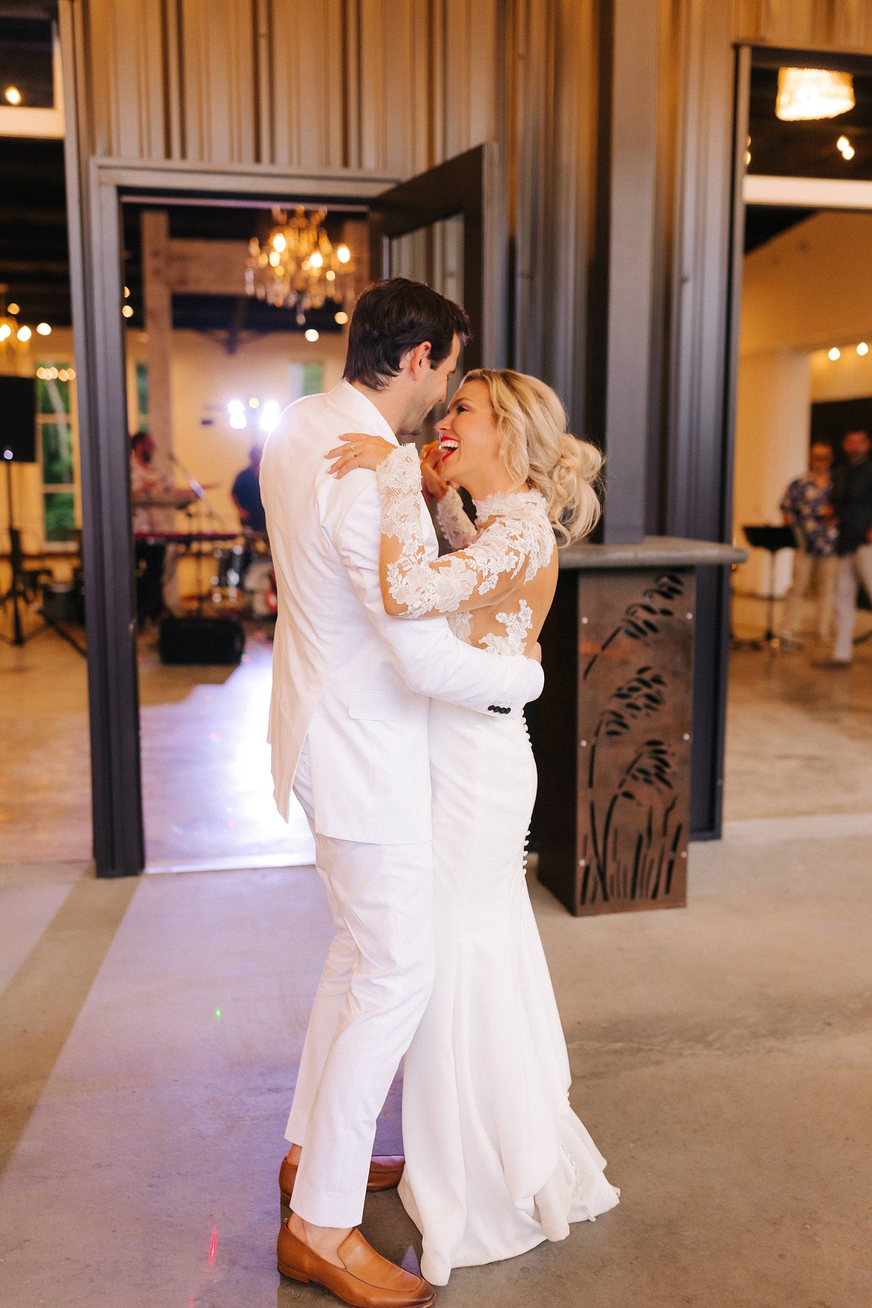 bride and groom dance together during Raleigh NC wedding reception