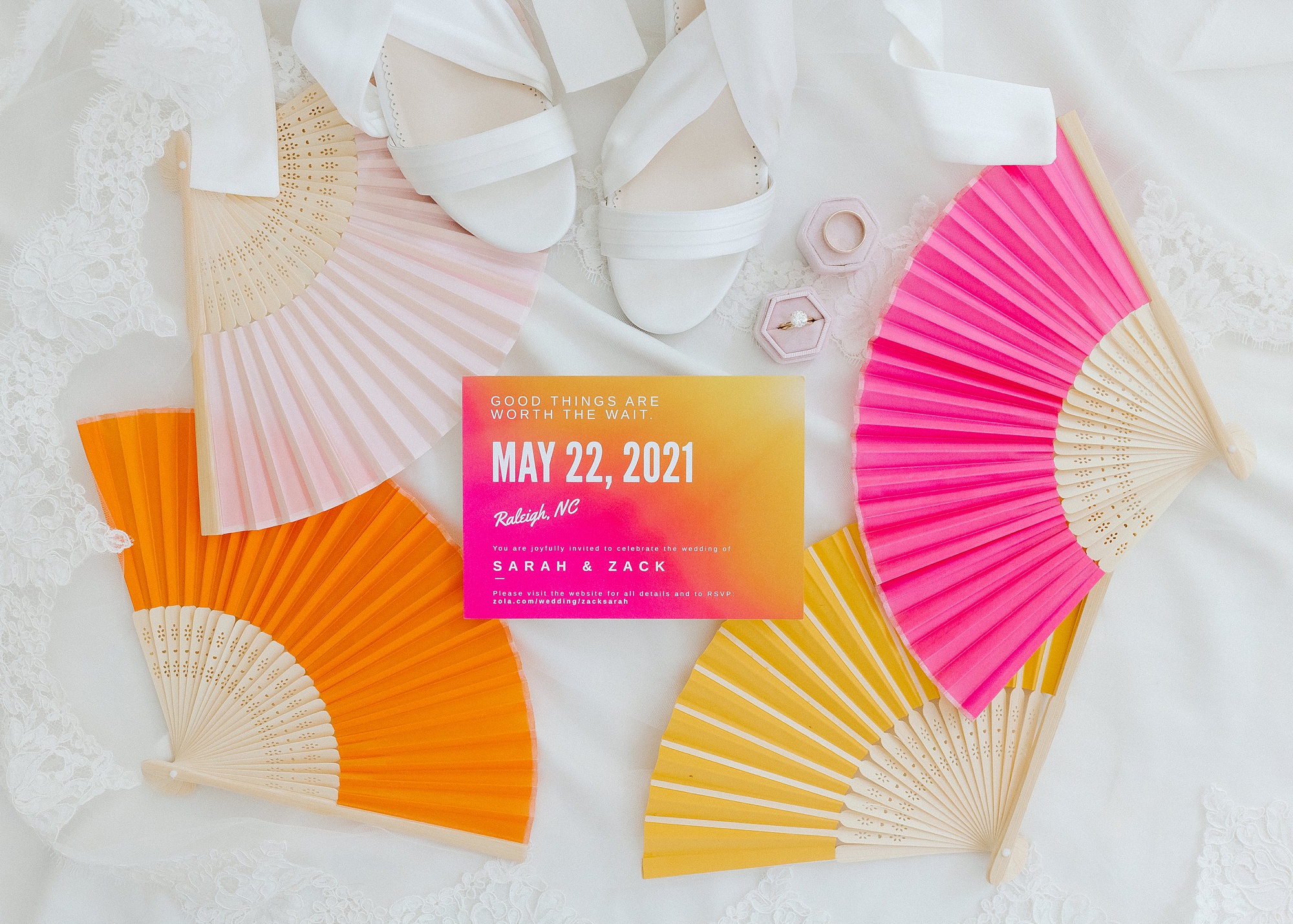bride's colorful fan and bright wedding invitation for summer wedding 