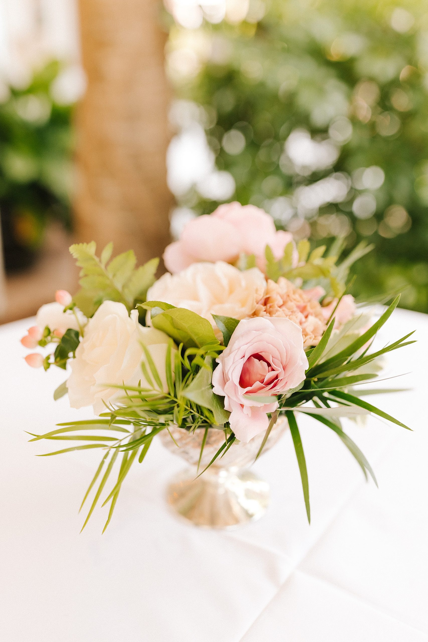 elegant pink and green floral decor for ceremony