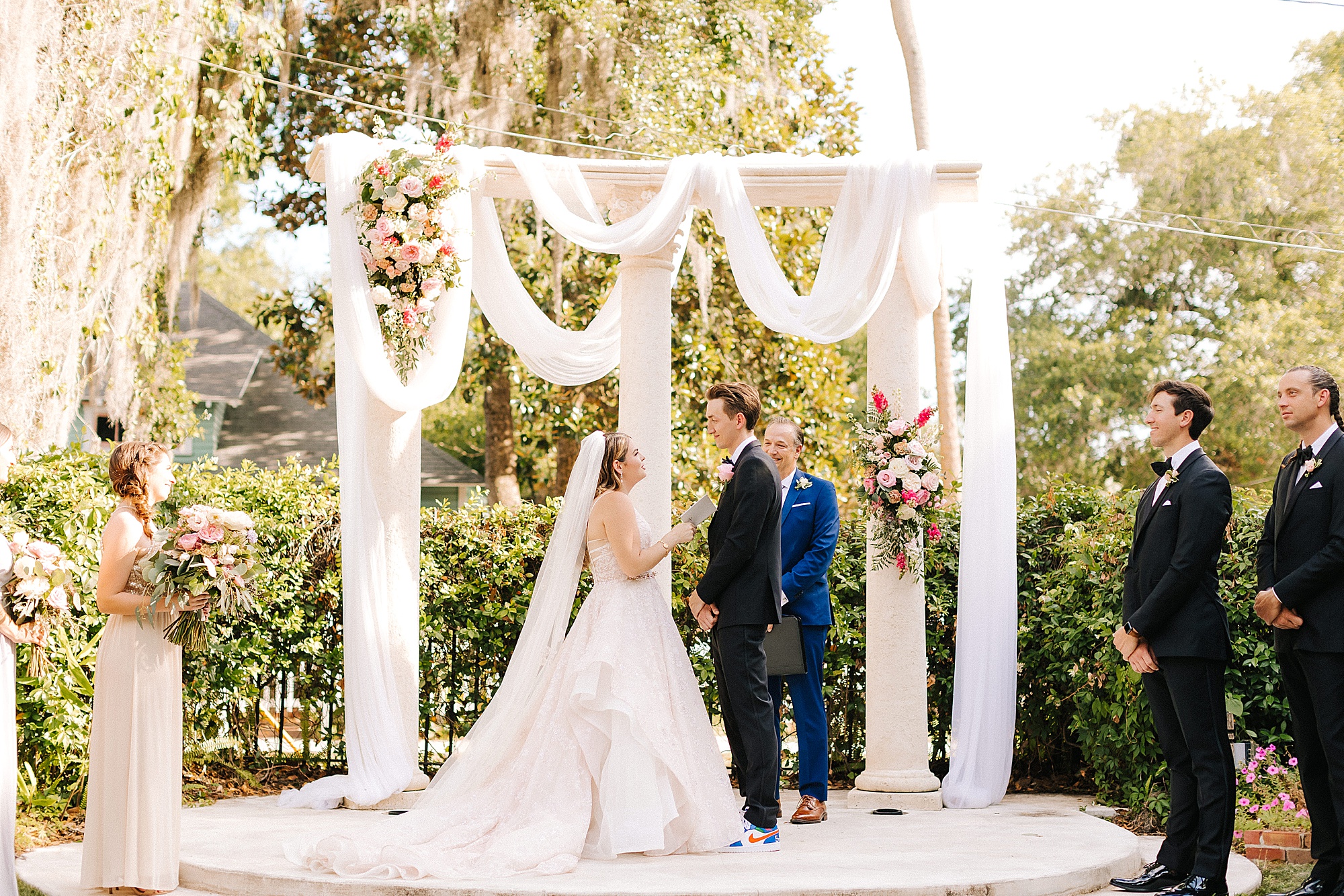 newlyweds exchange vows during outdoor wedding ceremony in Florida