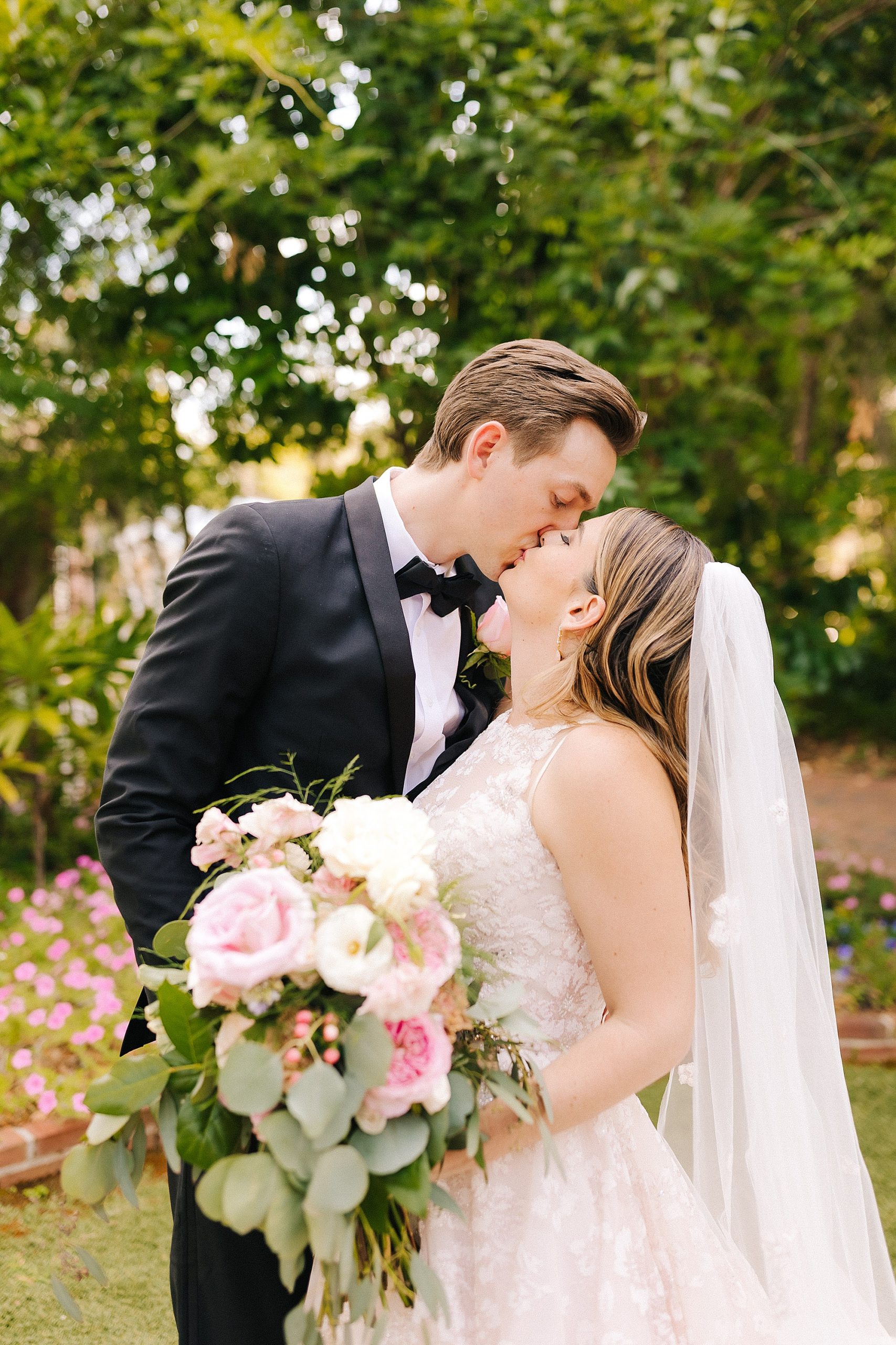 newlyweds kiss after Gainesville FL wedding