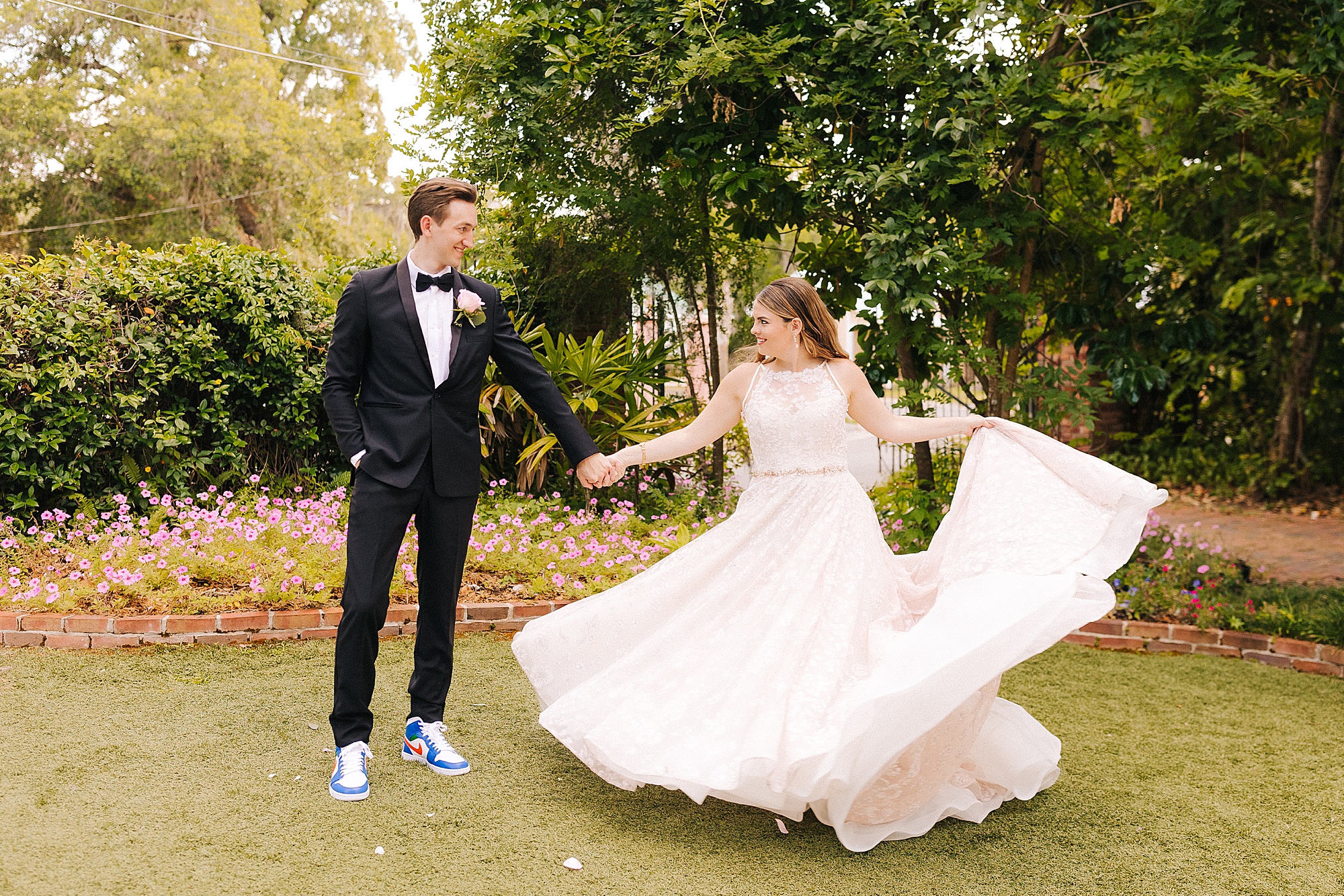 bride twirls wedding gown during photos in Gainesville FL