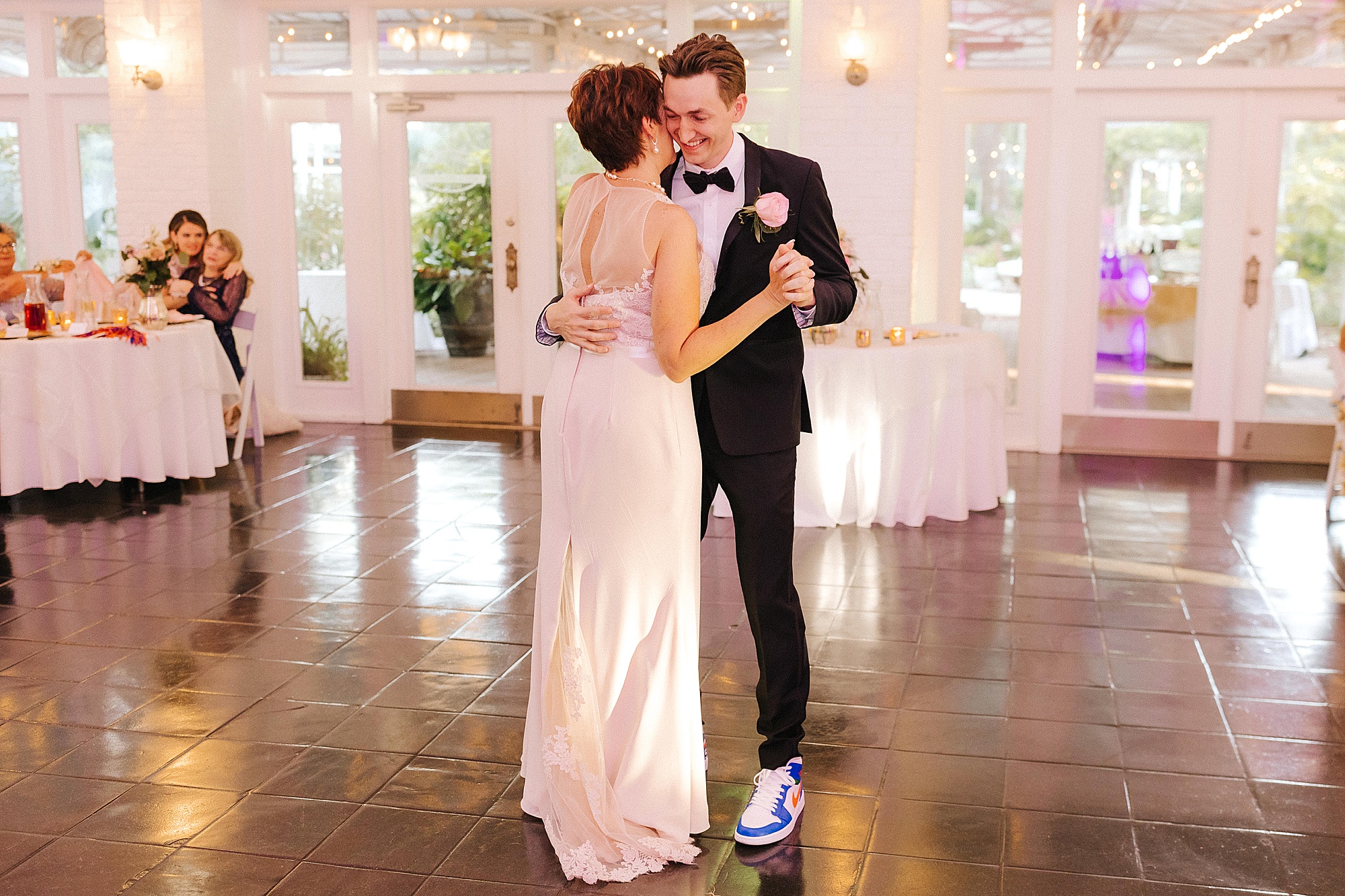 groom and mother dance during FL wedding reception