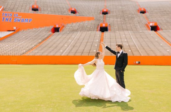 couple celebrates wedding day at the Gator stadium in Gainesville, FL